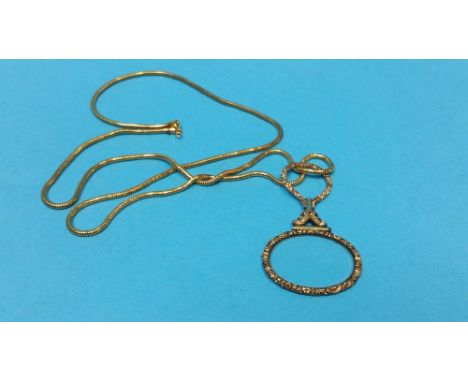 A yellow metal lorgnette