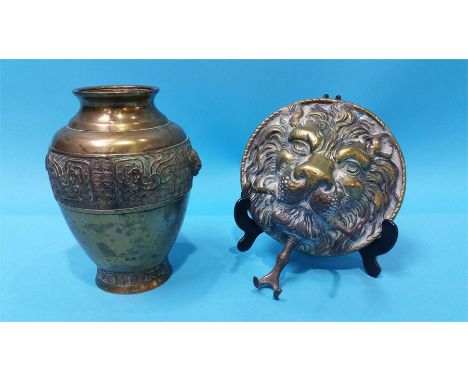 A Chinese bronze vase and a brass dinner gong lion mask stand