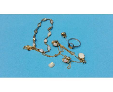 A 9ct gold bracelet set with ten opals, a 9ct gold necklace with opal pendant etc.