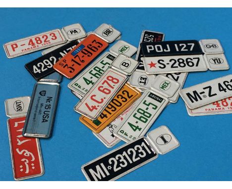 Collection of BP mini tin licence plates