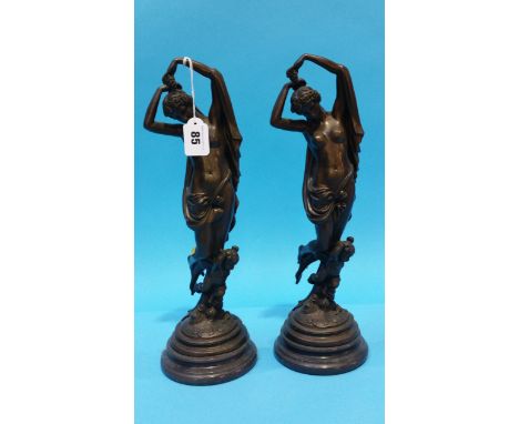 A pair of modern bronze statues