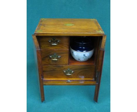 BRASS INLAID SMOKER'S CABINET FITTED WITH THREE DRAWERS AND CERAMIC TOBACCO JAR 
