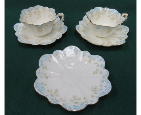 PAIR OF FOLEY WILEMAN & CO BLUE FLORAL AND GILDED CERAMIC CUPS AND SAUCERS PLUS ONE EXTRA SAUCER 