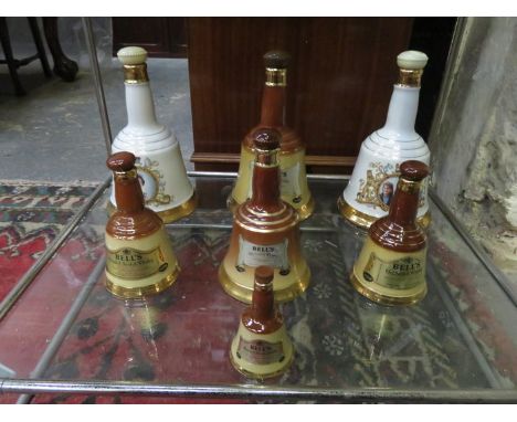 PARCEL OF BELLS CERAMIC WHISKY DECANTERS 