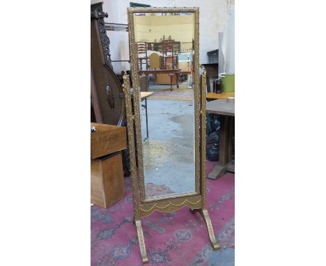 HEAVILY GILDED CHEVAL MIRROR