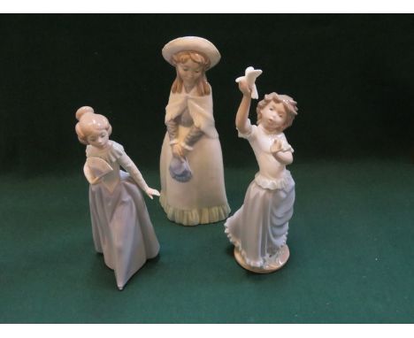 THREE VARIOUS NAO GLAZED CERAMIC FIGURINES