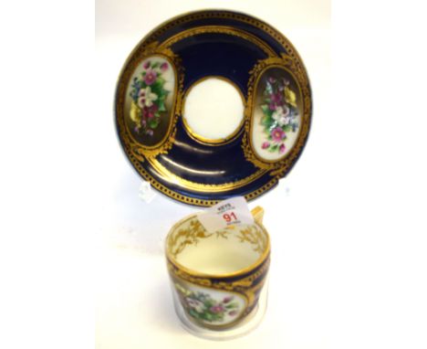 Late 18th/early 19th century Moscow (Gardner) factory porcelain cup and saucer decorated with a panel of flowers within gilt 
