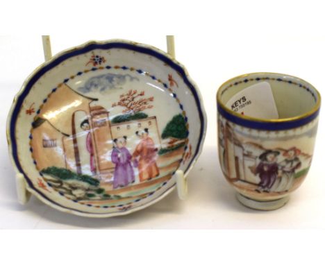 Late 18th century Chinese export porcelain cup with a saucer, the cup decorated in a European fashion with figures in a lands