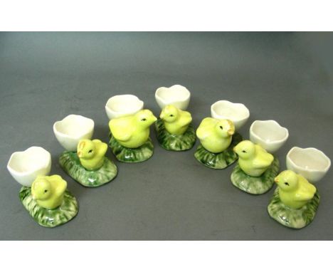 Novelty Ceramic Set Of 7 Chick Egg Cups. Colorful hand painted set. Height - 6cm / 2.36in. Length - 9cm / 3.54in.