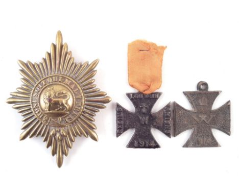 Victorian Worcester regiment helmet plate, also two WWI British made propaganda iron crosses (3) the helmet plate measures 11