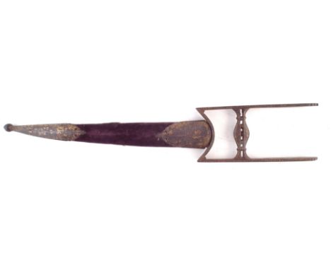 Indian Katar dagger and scabbard, with slightly curved fullered blade, gilt foliate decorated iron guard grip and scabbard mo