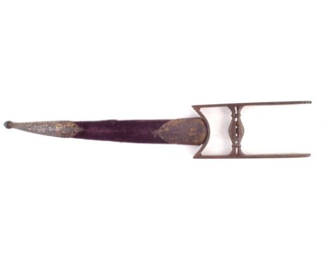 Indian Katar dagger and scabbard, with slightly curved fullered blade, gilt foliate decorated iron guard grip and scabbard mo