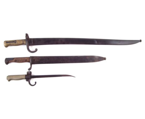 Three bayonets , to include a Chassepot M1866 pattern bayonet and scabbard with matching serial numbers R14836, dated 1874 to