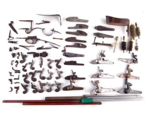 Collection of locks, hammers, and other gun parts, one lock marked 'Holland' another pair marked 'Westley Richards' together 