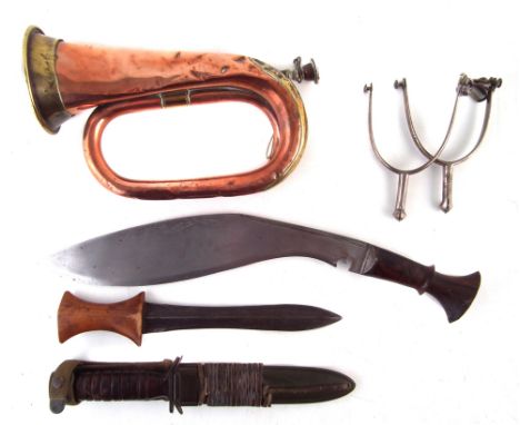 Collection of militaria to include a U.S. M3 Utica knife and scabbard, pair of best hard spurs, Henry Potter bugle dated 1892