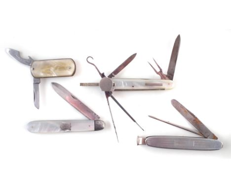 Fine seven bladed combination knife, with pearl grips, also a fruit knife with mother of pearl grip and silver blade hallmark