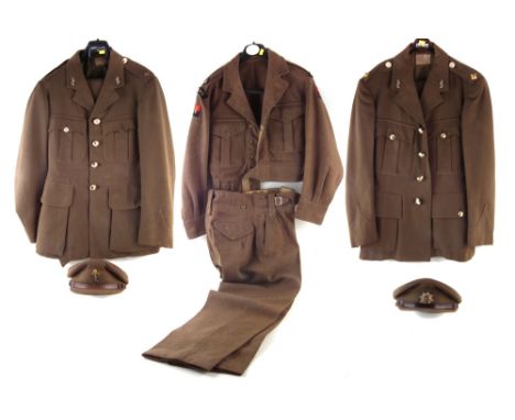Three British Army R.E.M.E. 1950's uniform jackets and trousers, two with caps. One of 1949 pattern dated 1954 size 2, (3)