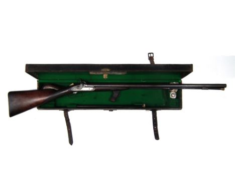 Williams and Powell 10 bore percussion double barrel sporting gun, Damascus barrels bearing Liverpool address, the engraved m