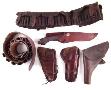 Wilkinson-Sword 'The Jungle Knife' and sheath which measures 40cm overall, also three leather revolver holsters, also and two
