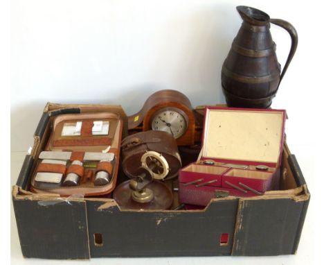 Art Deco mantel clock, oak metal bound jug, ships wheel, nut cracker, quantity travelling cases and plated canteen.Condition 