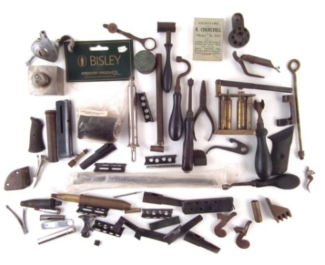 Collection shooting related items including clips , magazines, reloading tools, parts of guns, etc.