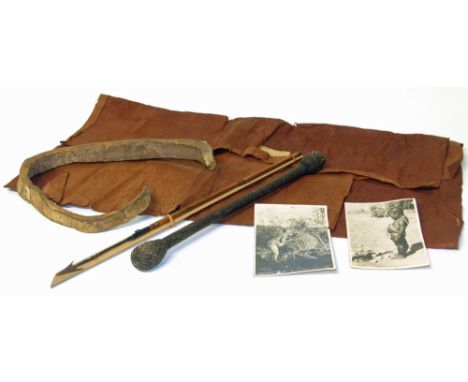 A colelction of tribal items, thought to be from the Luba tribe, to include a bark cloth (approximately 40" x 22") arrow or s