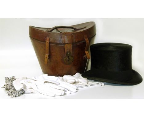 Henry Heath top hat in leather case with silk scarf and glovesCondition reports are not available for the Interiors Sale.