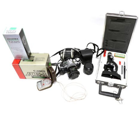 Canon AE1 Program Camera with FD f1.8 50mm lens (with original box) a few accessories and a few other items