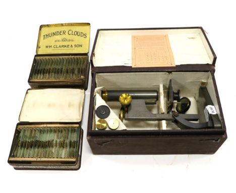 R & J Beck Student Microscope in box with Table of Magnifying Powers on lid; together with various prepared microscope slides