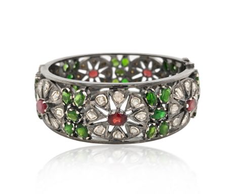 TSAVORITE RUBY AND DIAMOND BANGLE TSAVORITE RUBY AND DIAMOND BANGLE    sterling silver, the hinged bangle mounted with sliced