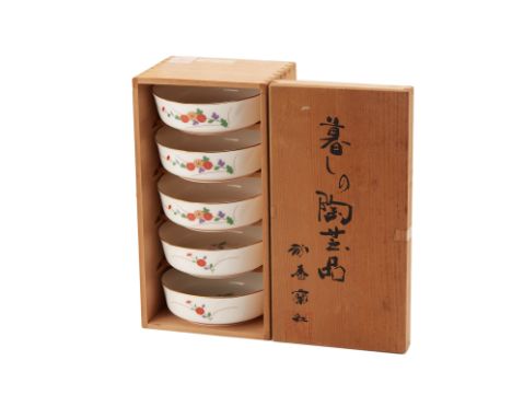 A SET OF JAPANESE CERAMIC BOWLS &amp; BOXED TEA SET
With floral motif decoration, both with boxes present
3.5cm high x 11.5cm