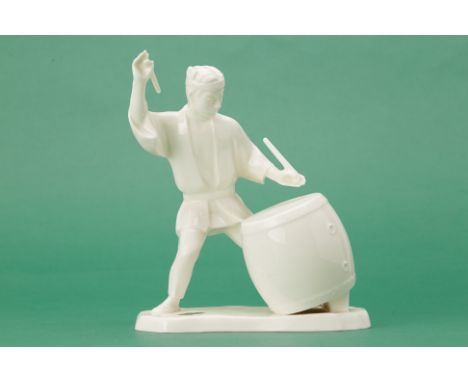 A NORITAKE PORCELAIN FIGURE
Of a figure banging a drum, with original box
20cm high
Condition: Signs of wear that commensurat
