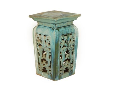 A LARGE ANTIQUE CHINESE CERAMIC STAND
Of square form, with auspicious motif and pierced scrolling foliate exterior
74cm high 