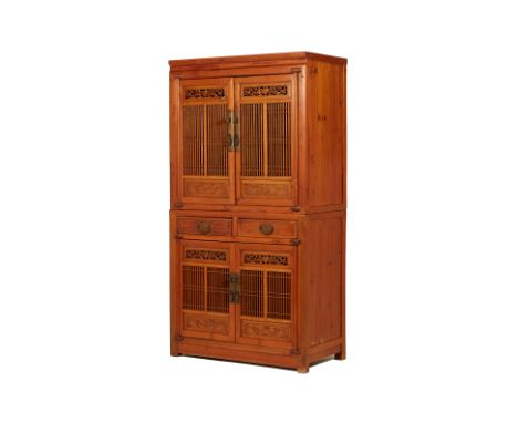 A LARGE CHINESE TWO SECTIONAL KITCHEN CABINET
With four cupboard doors and two short drawers, inset carved and openwork panel