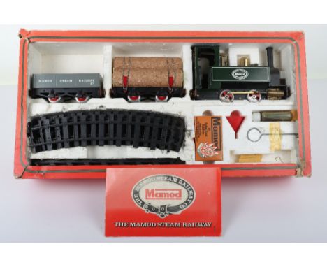 A boxed RS1 The  Mamod Live Steam Railway Company Goods Train Set, contents: SL1 Tank locomotive, green/black, Log wagon, wit