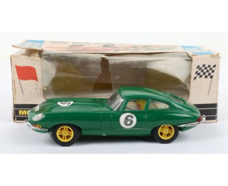 Scalextric C/34  ‘E’ Type Jaguar, green body, white interior, with driver, yellow spoked wheels, in excellent original condit