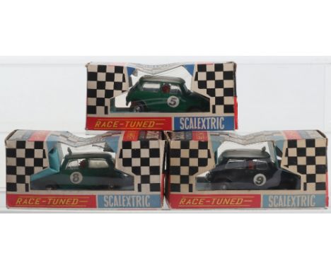 Three Boxed Scalextric Vintage C7 Rally Mini Coopers slot cars, 1.green body, white roof, RN.8, 2.black body, white roof RN.9