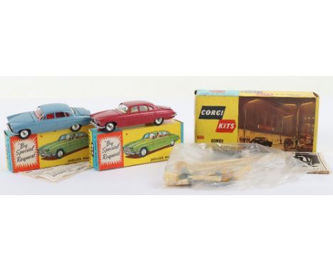 Two boxed Corgi Toys 238 Jaguar Mark Ten Models, metallic cerise body, yellow interior, shaped spun wheel hubs, in good origi