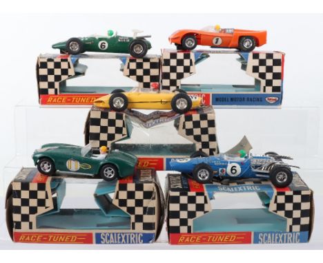 Five Boxed Scalextrics Racing Cars, C8 Lotus Indianapolis GP, C62 Ferrari F1, yellow, in a C/92 Porsche box (one end flap mis