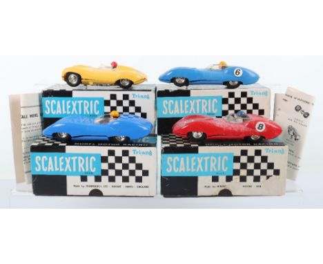 Four Vintage Boxed Scalextric Jaguar Racing Cars, MM/C56 Lister Jaguar blue, correct colour spot on box, with internal packin