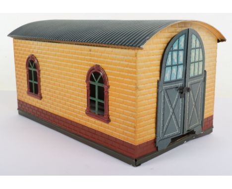 Bing tinplate 0 gauge Engine shed, 1920s, brick effect engine shed finished in orange and brown with four windows, hinged lit