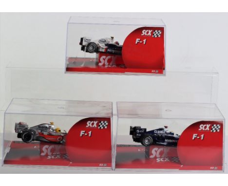 Three Boxed  SCX F1 Model Slot Cars, Ref 63140 BMW Sauber F1, Ref 62880 Williams F1 FW28 and Ref 62870 Vodafone McLaren Merce