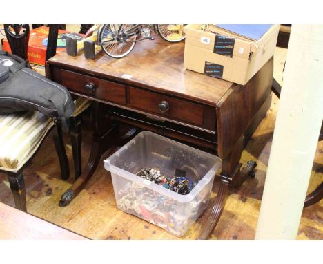 19th Century mahogany two drawer sofa table on shaped supports and brass paw feet