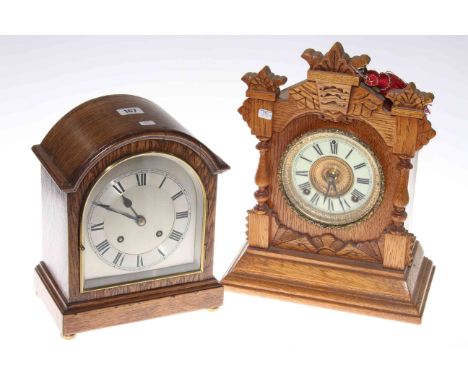 Two oak mantel clocks
