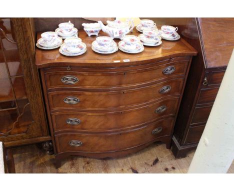 Bevan Funnell Ltd Georgian style yew serpentine front chest having brush slide above four long drawers on splayed bracket fee