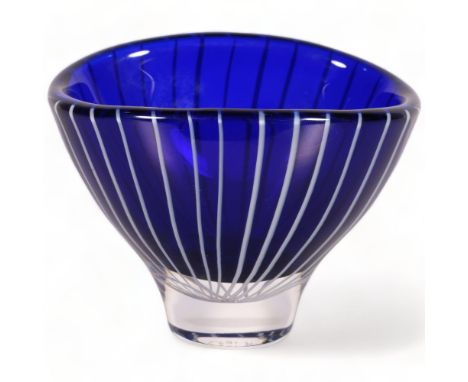 Vicke Lindstrand for Kosta, a small oval shaped bowl in blue glass overlain with white milk glass cane stripes cased in clear