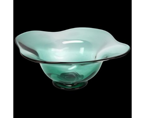 Simon Gate for Orrefors, Sweden, a 1930 designed large green glass footed bowl, marked to base Orrefors 1930 GU 69, diameter 