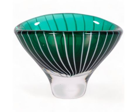 Vicke Lindstrand for Kosta, a small oval shaped bowl in dark green glass with whitemilk glass cane stripes cased in clear gla