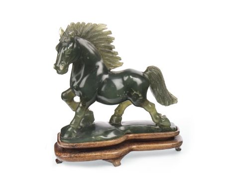 CHINESE FIGURE OF A GALLOPING HORSE, in simulated green jade, with flowing mane and tail, on a fixed base, on a detachable wo