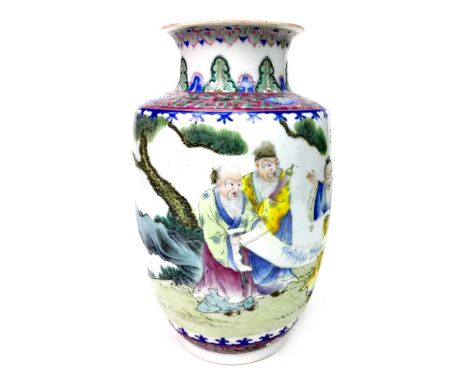 EARLY 20TH CENTURY CHINESE VASE, painted with scholars with a scroll in a garden setting, four character mark to base, 27cm h